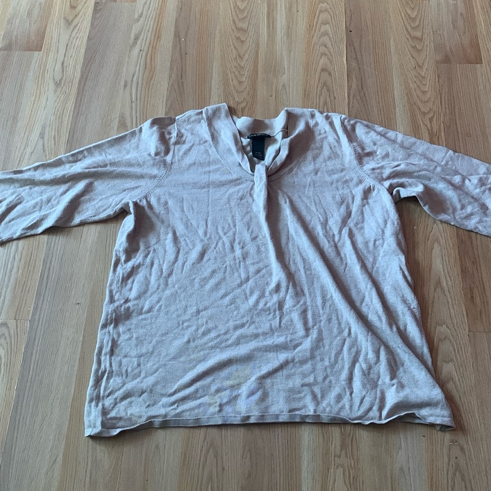 This is a tan  top for the plus size Gies